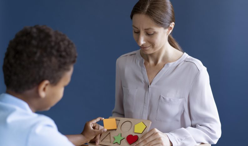 kid-doing-occupational-therapy-session-with-psychologist