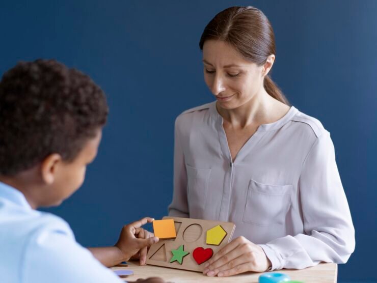 kid-doing-occupational-therapy-session-with-psychologist